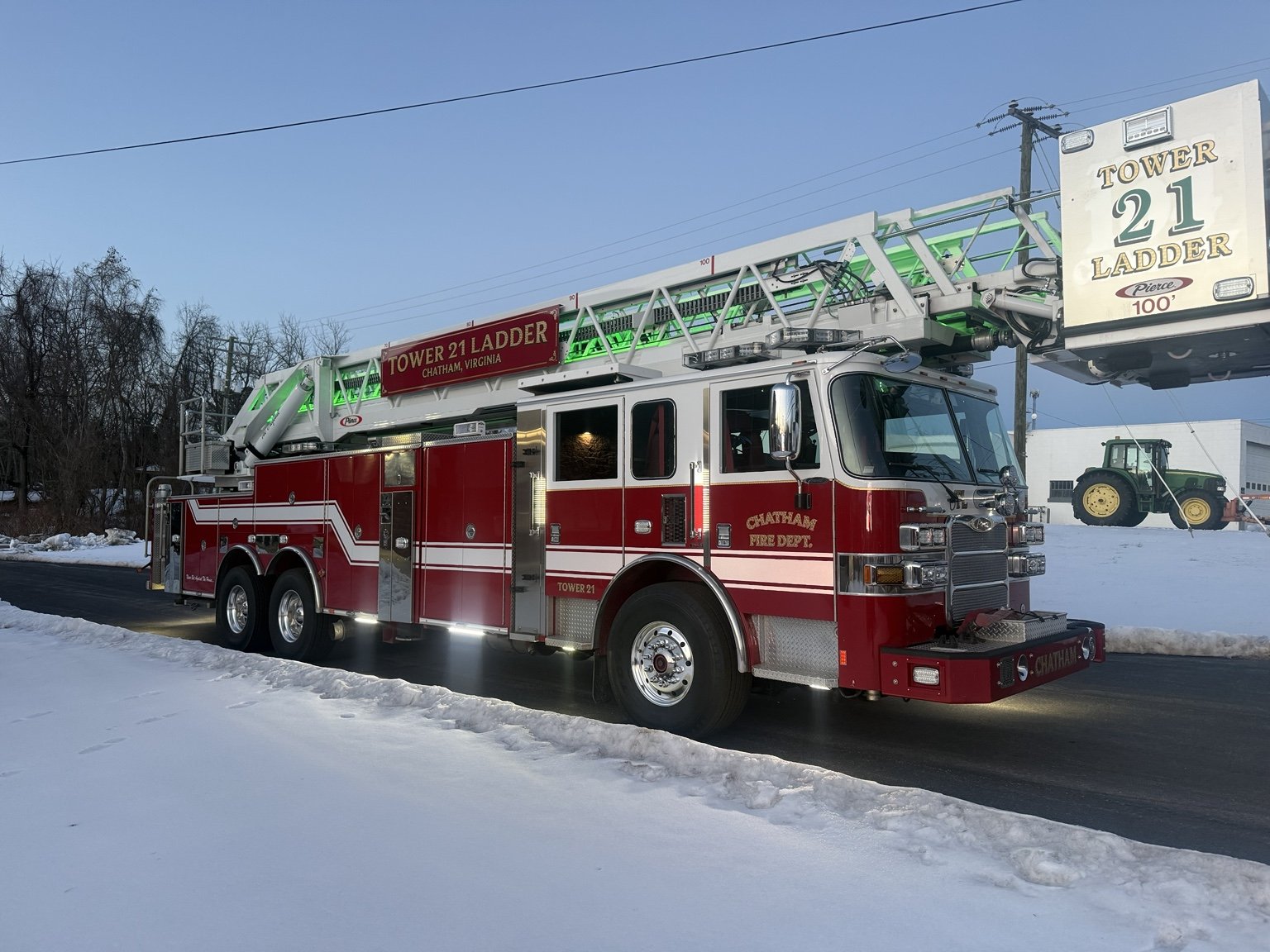 Chatham Fire Department Tower 21, red and white 100-foot aerial ladder truck